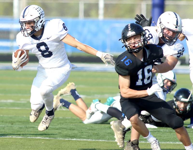 Cary-Grove’s Andrew Prio runs the ball against Highland Park in second-round IHSA Class 6A playoff action at Wolters Field in Highland Park Saturday.