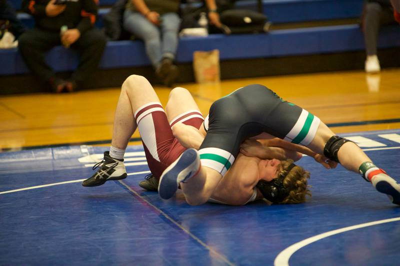 Oak Lawn's Luke Tesinsky competes with Wheaton Academy's Ian Tanaceal in the 175 lb. class at the Newbill Invitational on Saturday, Jan.6,2024 in Geneva.