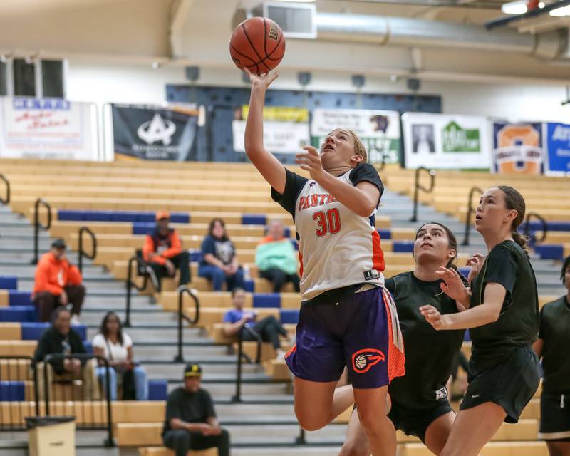 Oswego's Peyton Johnson puts up a shot at the Oswego girls basketball shootout tournament. June 28, 2024.