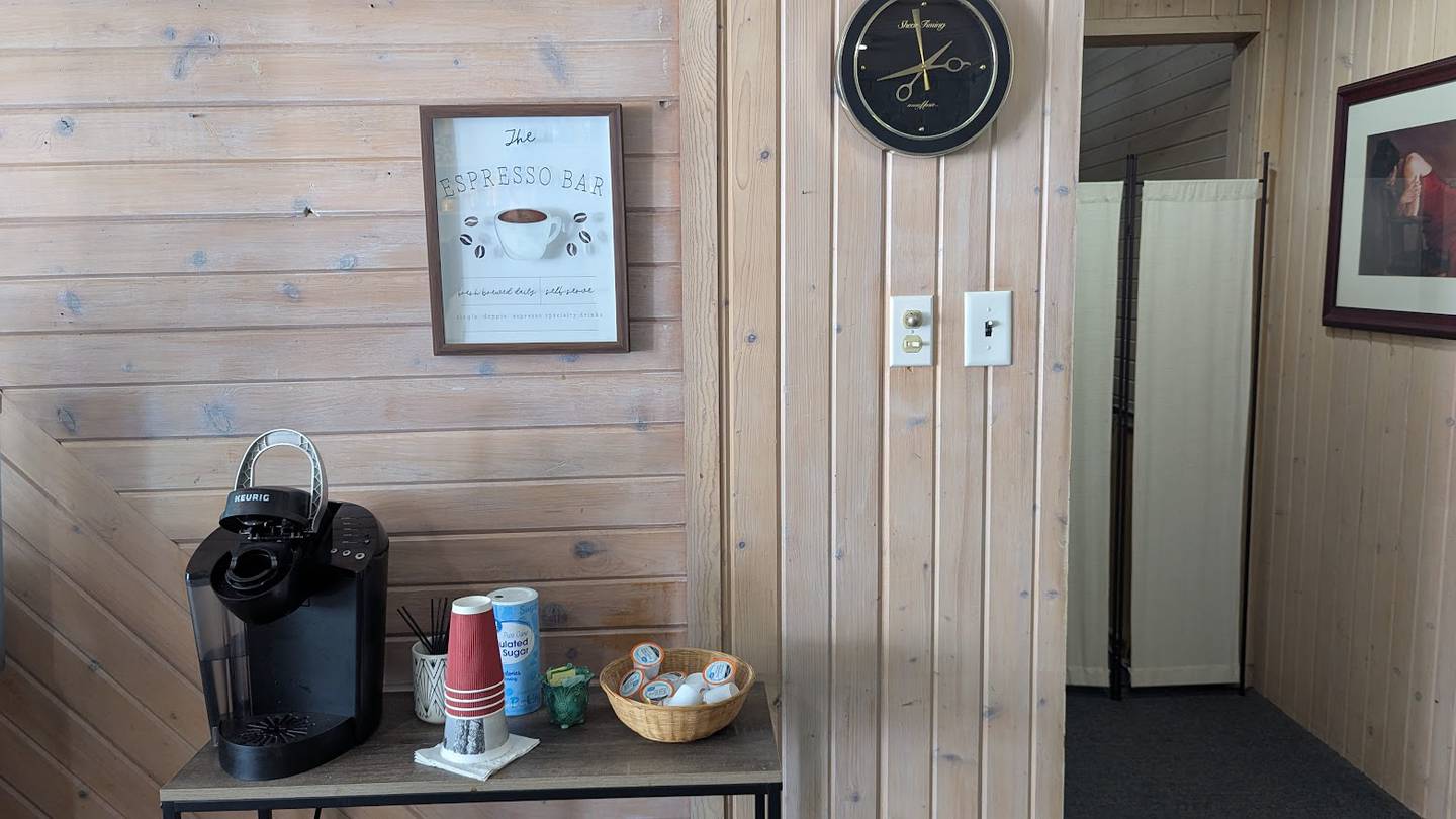 A coffee bar is seen inside Chet's Hair Studio on Wednesday, May 28, 2025, in Joliet.