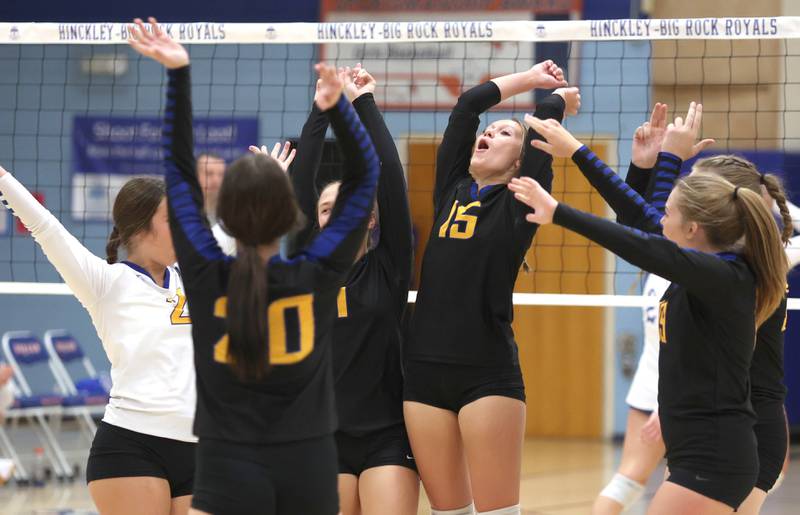 Somonauk players celebrate a point during their match Thursday, Sept. 15, 2022, at Hinckley-Big Rock High School.