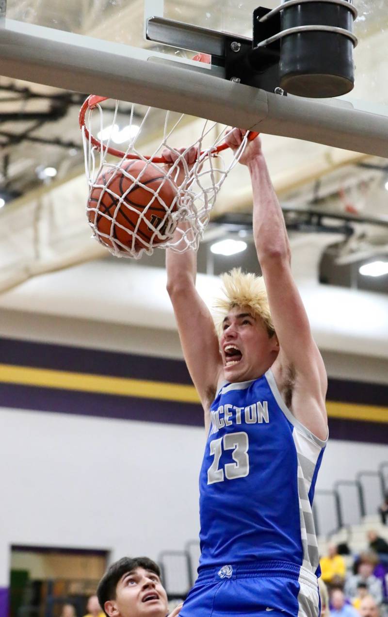 Princeton's Noah LaPorte throws down a dunk at Mendota Friday night. He scored 20 points to lead the Tigers to a 60-47 win.