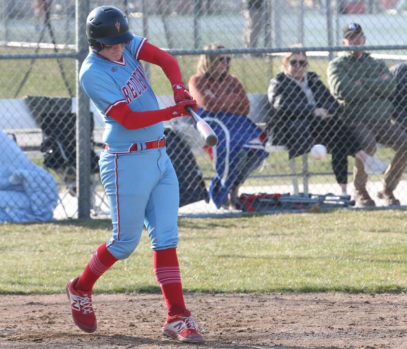 Hall's Dom Galetti smacks a base hit against Ottawa on Tuesday, March 28, 2023 at Ottawa High School.