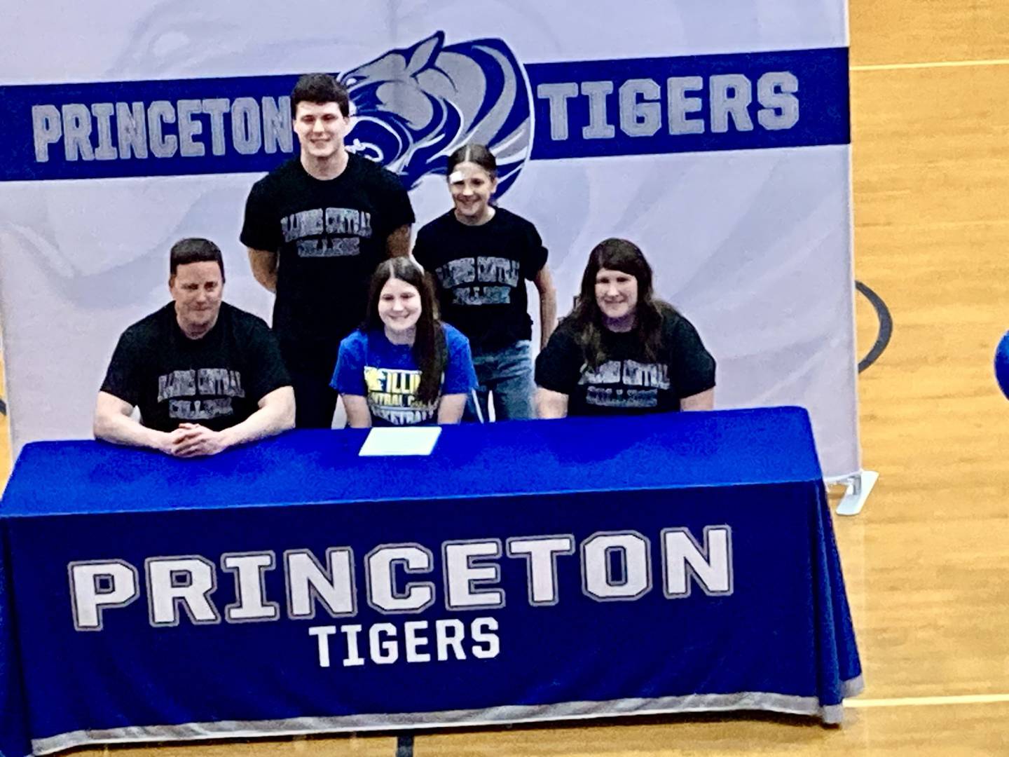 Princeton senior Camryn Driscoll (front, center) was accompanied for her college signing Tuesday evening by her parents, Garey and Courtney; and (back row) brother Evan and sister Lauren.
