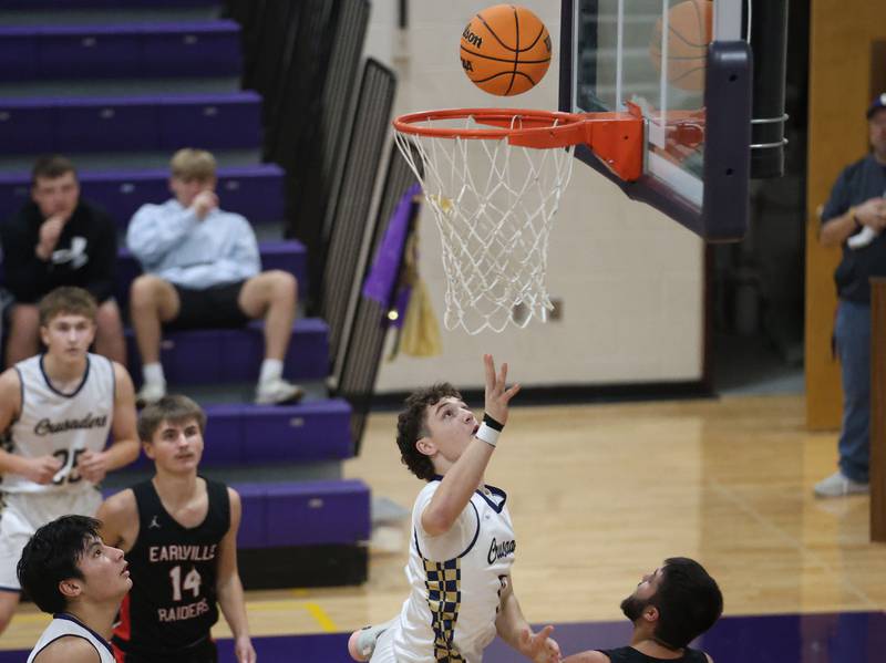 Marquette's Easton DeBernardi watches his layup shot go in against Earlville during the Huskers Hardwood Tip-Off Tournament on Tuesday, Nov. 25, 2025 in Serena.