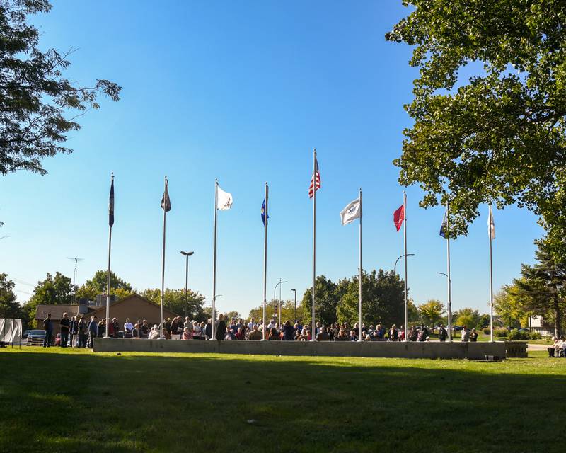 A large crowd gathered for a dedication ceremony marking the completion of phase one of the DeKalb Elks Veteran’s Memorial Plaza in DeKalb Saturday, Oct. 1, 2022.