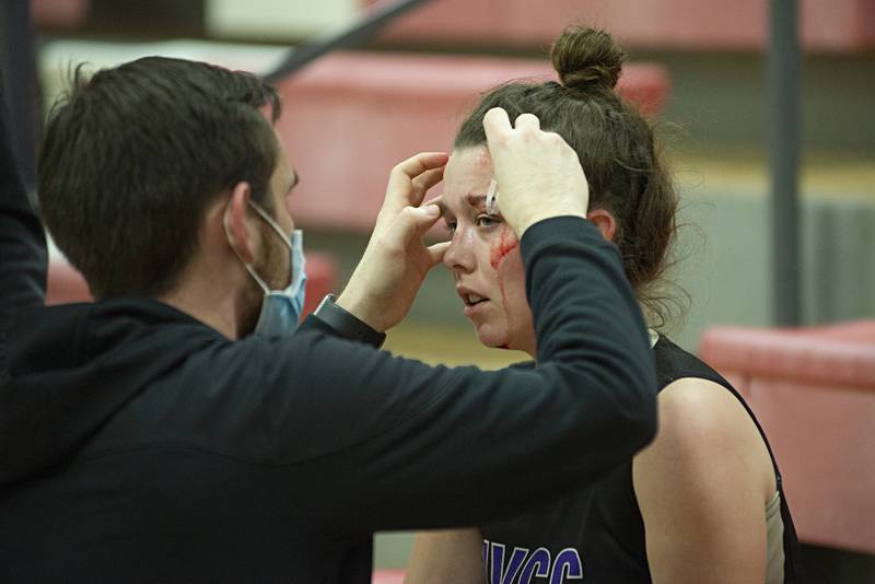 IVCC"s Keally Braman has a cut above her eye taped up during a game against SVCC on Thursday, Feb. 3, 2022.