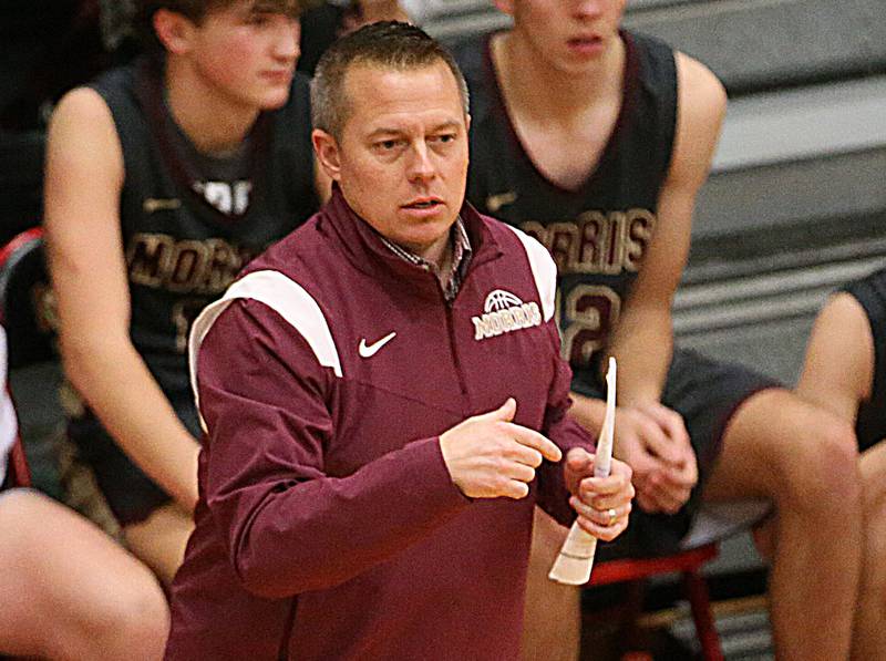 Morris's head boys basketball coach Joe Blumberg coaches his team against L-P in Sellett Gymnasium in 2023 at L-P High School.