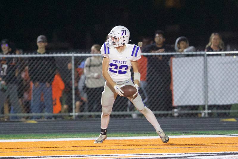 Burlington Central's Joseph Kowall scores a touchdown against McHenry on Friday, Oct. 21,2022 in McHenry.