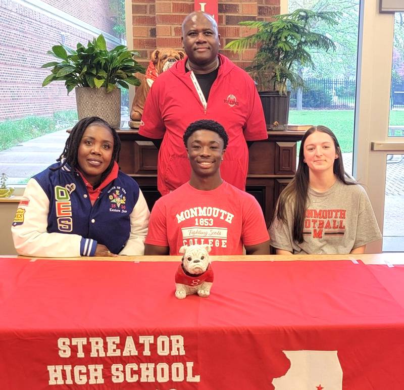 Recent Streator graduate Jordan Lukes has committed to continue his education at Monmouth College and his football career at the NCAA Division III level with the Fighting Scots. Lukes is pictured here at his signing ceremony bookended by Tammie Lukes and Jayden Nantz, with the late Streator assistant coach Ed Lewis standing behind.