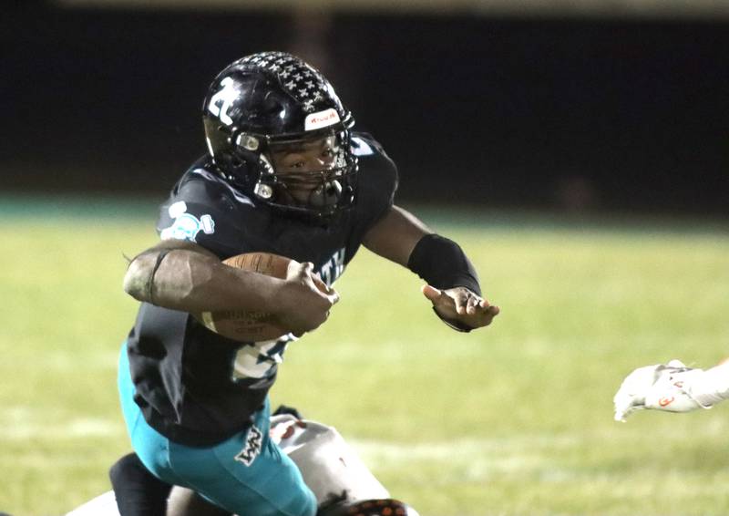 Woodstock North’s David Randecker runs the ball against Freeport in first-round IHSA Playoff football action on Saturday, Nov. 2, 2024 at Woodstock North High School in Woodstock.