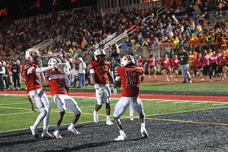 Bradley-Bourbonnais' LyZale Edmon (13) celebrates a touchdown with teammates during the Boilermakers' 41-6 victory over Crete-Monee on Friday, Sept. 5, 2025.