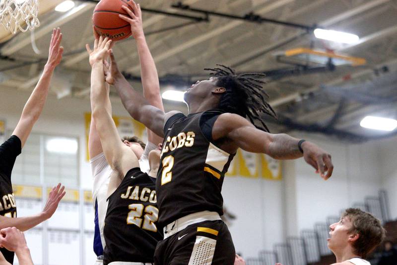 Jacobs’  Treval Howard looks for a rebound against Lake Zurich’s in Hinkle Holiday Classic boys basketball tournament game action at Jacobs High School Tuesday.