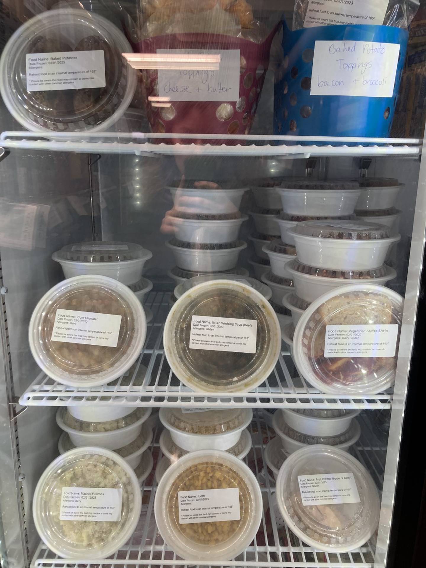 Food packaged by the Huskie Harvest program sitting in a freezer at the Huskie Pantry, where students can receive free meals twice a week. Photo provided by Northern Illinois University.