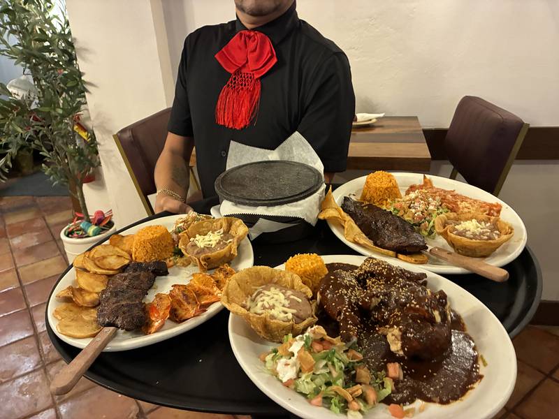 Food trays head out to the dining room at El Molino Mexican Restaurant  on Tuesday, Dec. 23, 2025. The Mexican restaurant at 2112 Elgin Road, Carpentersville, recently reopened with new owners and an updated interior.