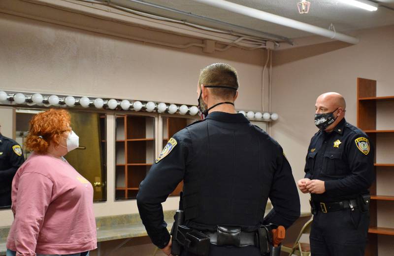 Twenty-four police officers participated in a 40-hour state-certified Crisis Intervention Team training. On Thursday, Jan. 21, the officers underwent scenario training with professional actors to practice de-escalation at the Egyptian Theatre in DeKalb. From left, actor Kathleen Puls Andrade, DeKalb Police Department Patrolman Phillip Brown and DeKalb Police Department Commander Jason Leverton.