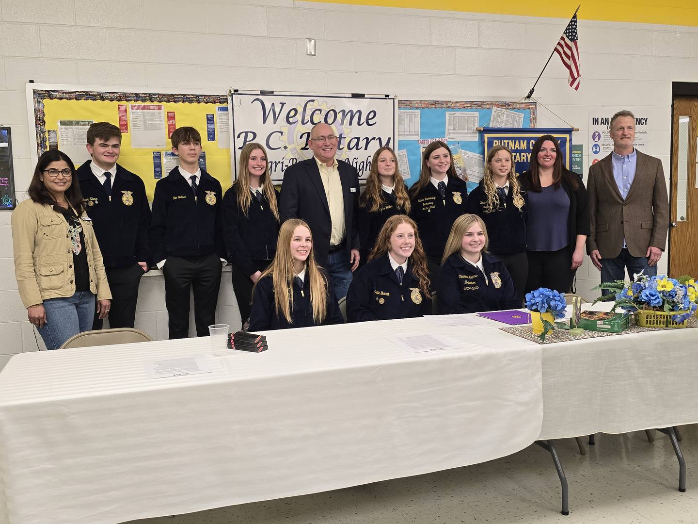 Putnam County FFA members pose for a photo with officials from Corn Belt Ports on Thursday, March 27, 2025, at the Rotary Club's Ag Night.