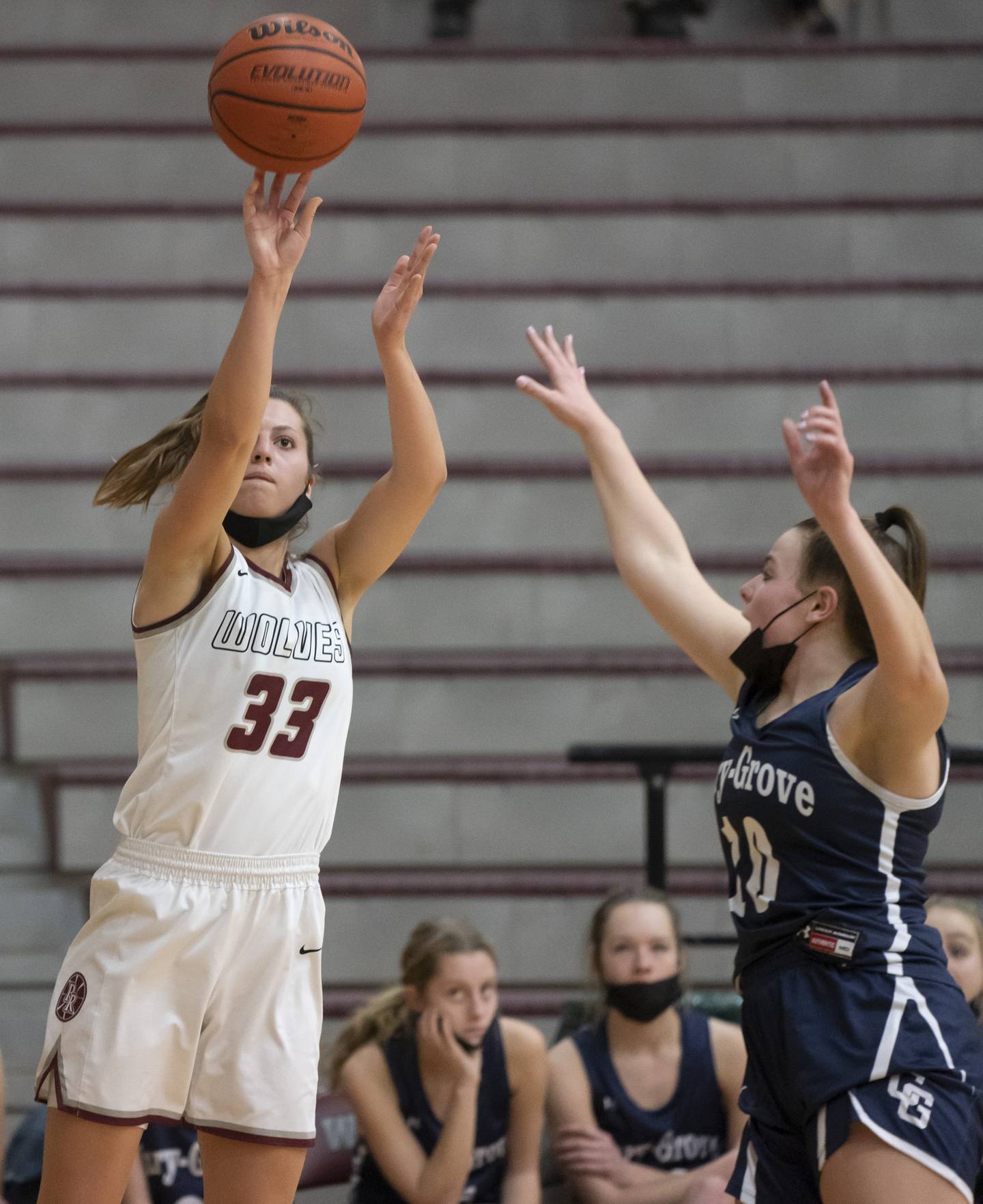 Prairie Ridge's Karsen Karlblom shoots over Cary-Grove's Emily Larry during their game on Wednesday, January 19, 2022 at Prairie Ridge High School in Crystal Lake. Ryan Rayburn for Shaw Local