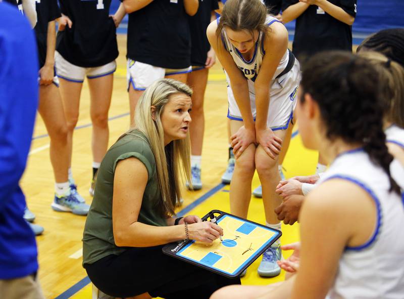 Lyons' coach Meghan Hutchens talks to the team during the girls varsity basketball game between Benet Academy and Lyons Township on Wednesday, Nov. 30, 2022 in LaGrange, IL.