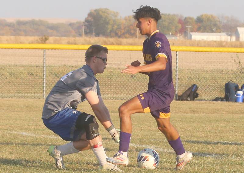 Mendota's Sebastain Carlos arrives late to the ball as Princeton keeper Landon Davis picks it up in the box during the Class 1A Regional final game on Tuesday, Oct. 22, 2024 at Serena High School.