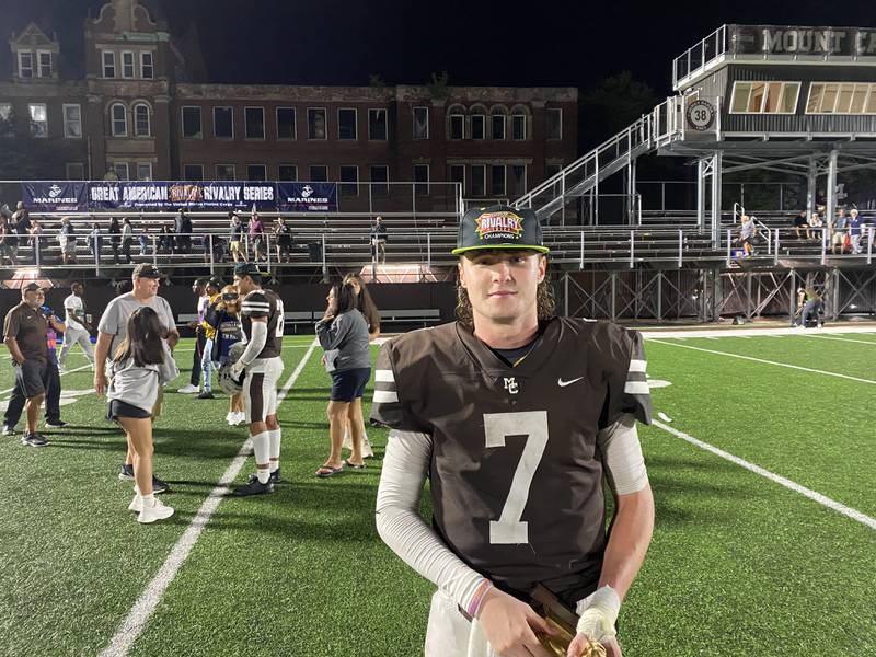 Mount Carmel quarterback Blainey Dowling threw for five touchdowns in the Caravan's 35-3 win over St. Rita on Friday.