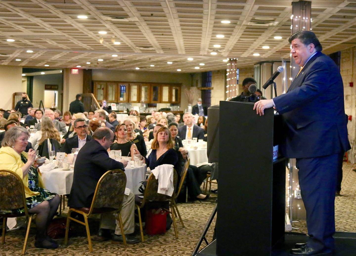 Governor JB Pritzker speaks to a full house at Two Brothers Roundhouse in Aurora for the Kane County Democrats’ Truman Dinner on Sunday, Feb. 27, 2022.