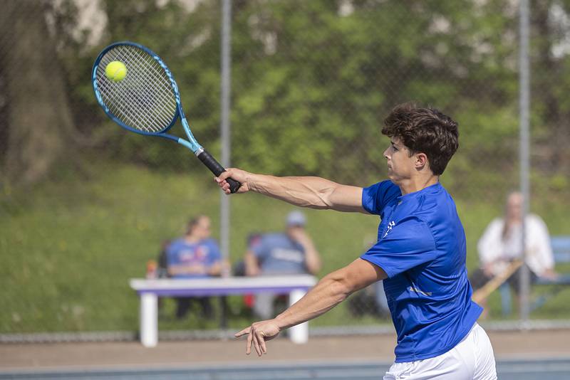 Newman’s Ryan Partington returns a shot to Dixon’s Bashar Elbzour Tuesday, May 9, 2023.
