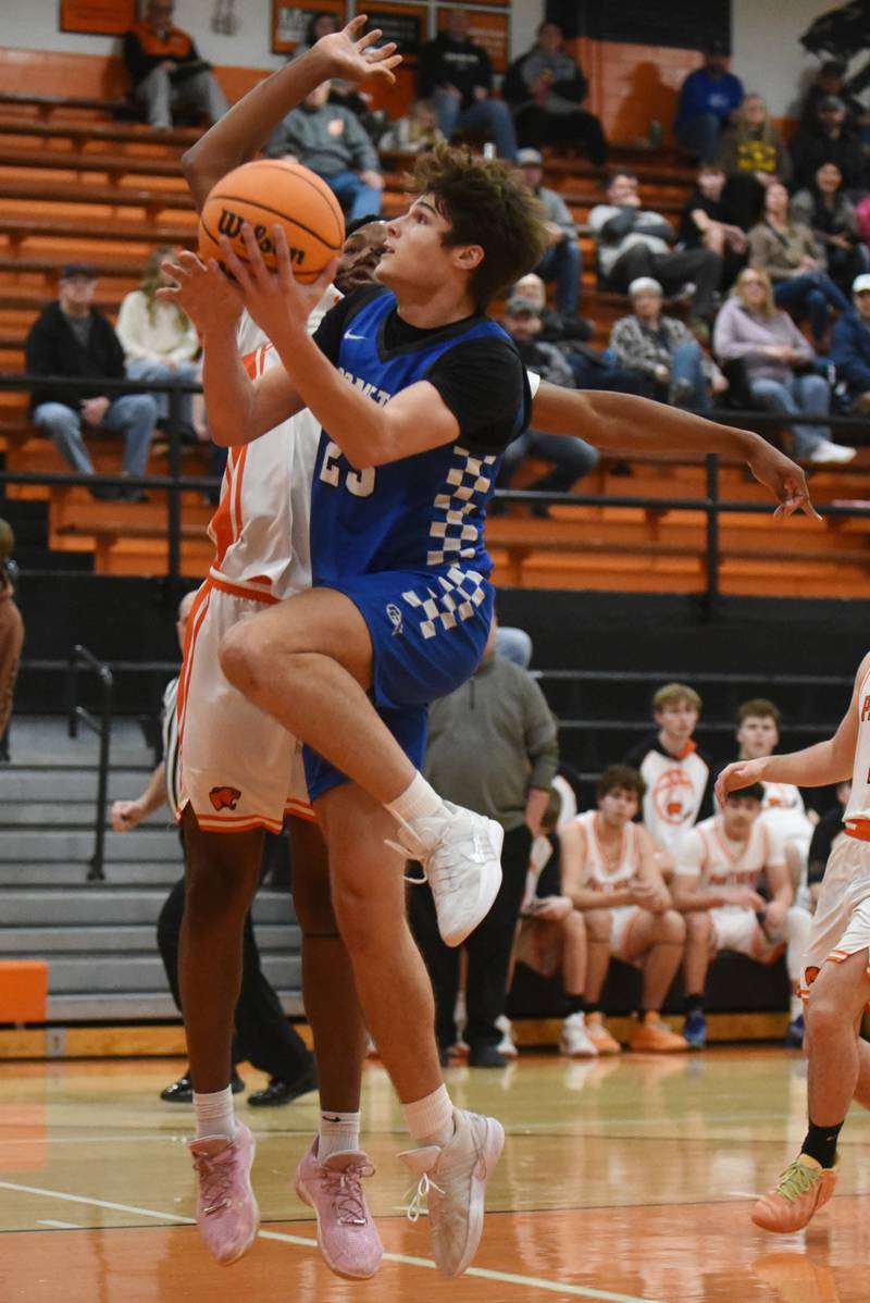 Clifton Central's Mayson Mitchell, front, attempts a layup as Gardner-South Wilmington's Leondre Kemp defends during the River Valley Conference Tournament semifinals at Gardner-South Wilmington Tuesday, Feb. 10, 2026.
