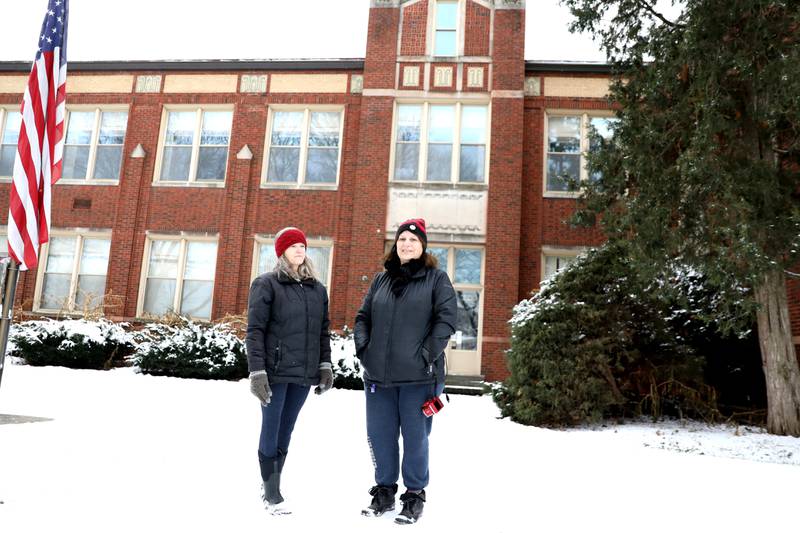 A group of La Grange Park residents including Patti Conway (left) and Deb Drolenga (right) have circulated a petition to halt the demolition of the former Oak Avenue School in La Grange Park. The building was home to the American Nuclear Society until recently. “in my opinion this building lends itself to be repurposed in so many different facets,” said Patti Conway.