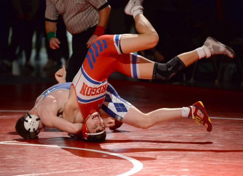 Oregon's Ethan Mowry is upended by Sterling Newman's Blair Ivey in the 157-pound match at the 1A team sectional held Tuesday, Feb. 25, 2025 in the Blackhawk Center in Oregon.