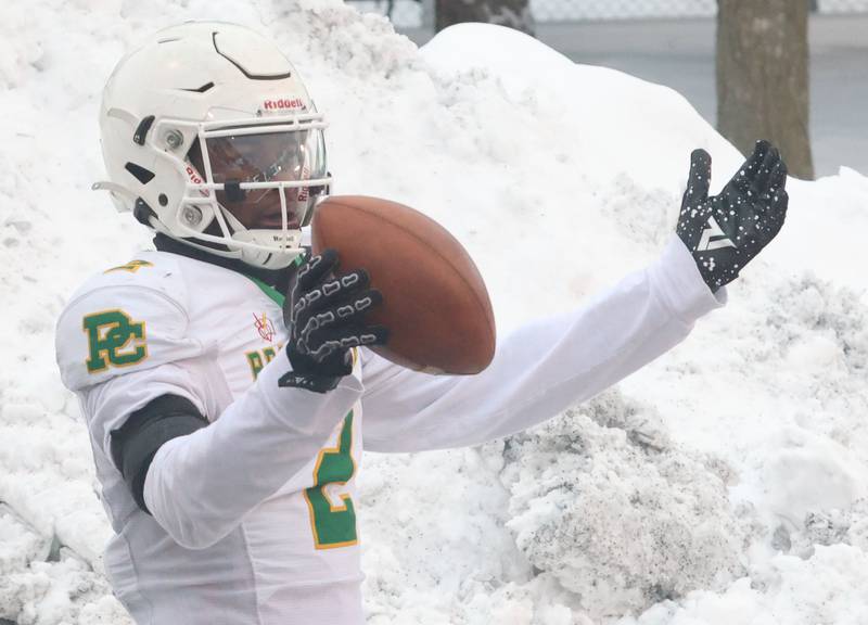 Providence Catholic's Xavier Coleman reacts after scoring a toughdown during the Class 5A State championship on Tuesday, Dec. 2, 2025 in Hancock Stadium at Illinois State University in Normal.