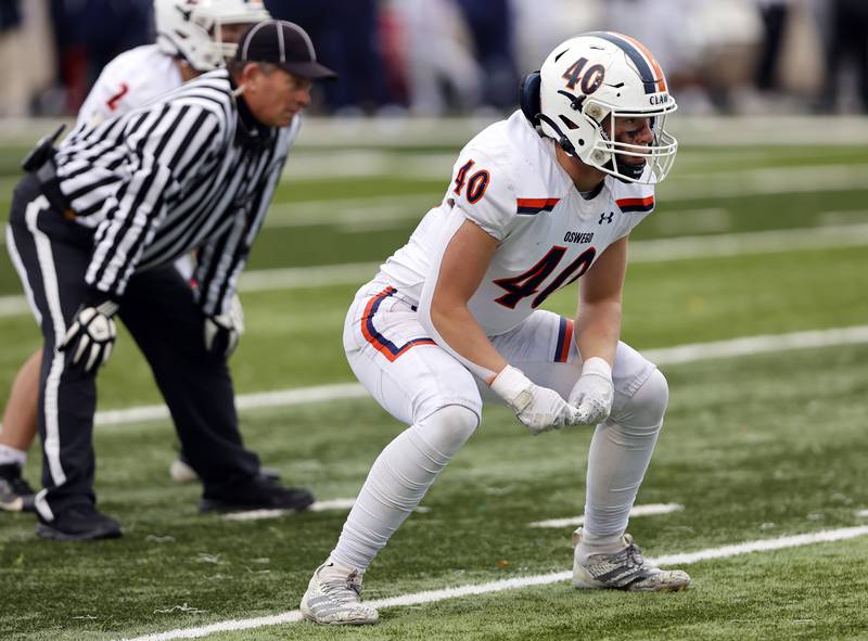 Oswego's Ammar Banire (40) waits for the snap during the varsity football second-round 8A playoff game between Oswego and Lane Tech on Saturday, Nov. 8, 2025 in Chicago.