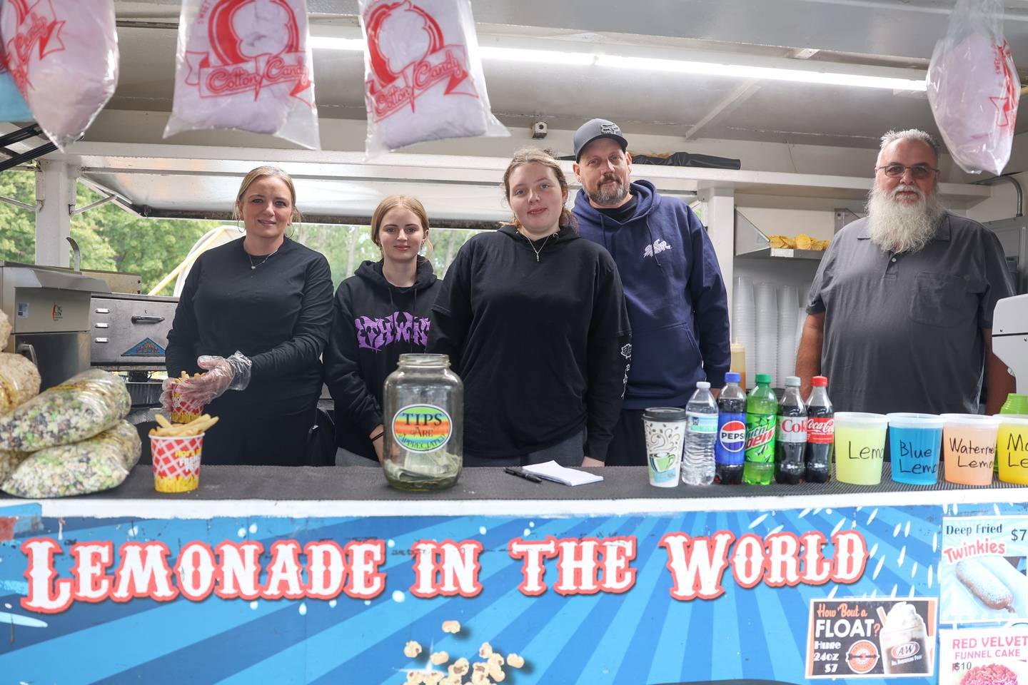 Mr. Salty’s food truck crew Rebecca Olson, left, Olivia Glowackia, Chloe Olson, Jeremy Olson and Rich Golowacki work the Hayride Horrors on Monday, Oct. 14, 2024 at Dellwood Park in Lockport.