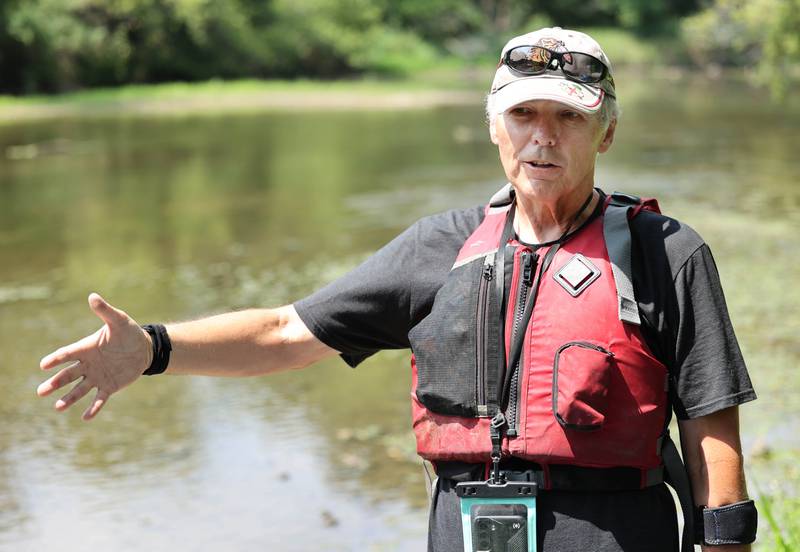 Greg Romaneck talks Thursday, Aug. 10, 2023, about taking care of our natural environment along the banks of the Kishwaukee River at the Knute Olson, Jr. Forest Preserve in Kingston. Romaneck has been making regular visits to pick up trash as he kayaks the river and been an advocate for keeping the river and its surroundings free of pollution.