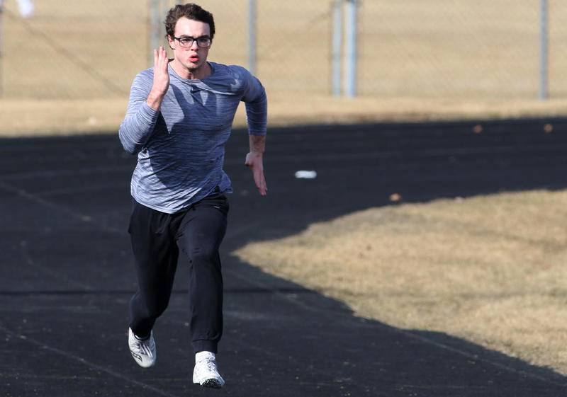 Marengo's Finn Schirmer practices with the boys track and field team Tuesday at Marengo.