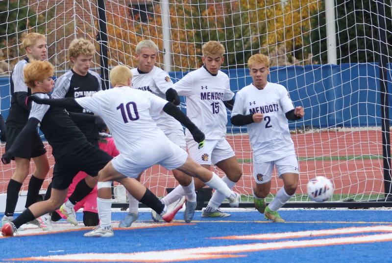 Columbia players kick the ball to score the first goal against Mendota during the Class 1A State title game on Saturday, Nov. 8, 2025 at Hoffman Estates High School.