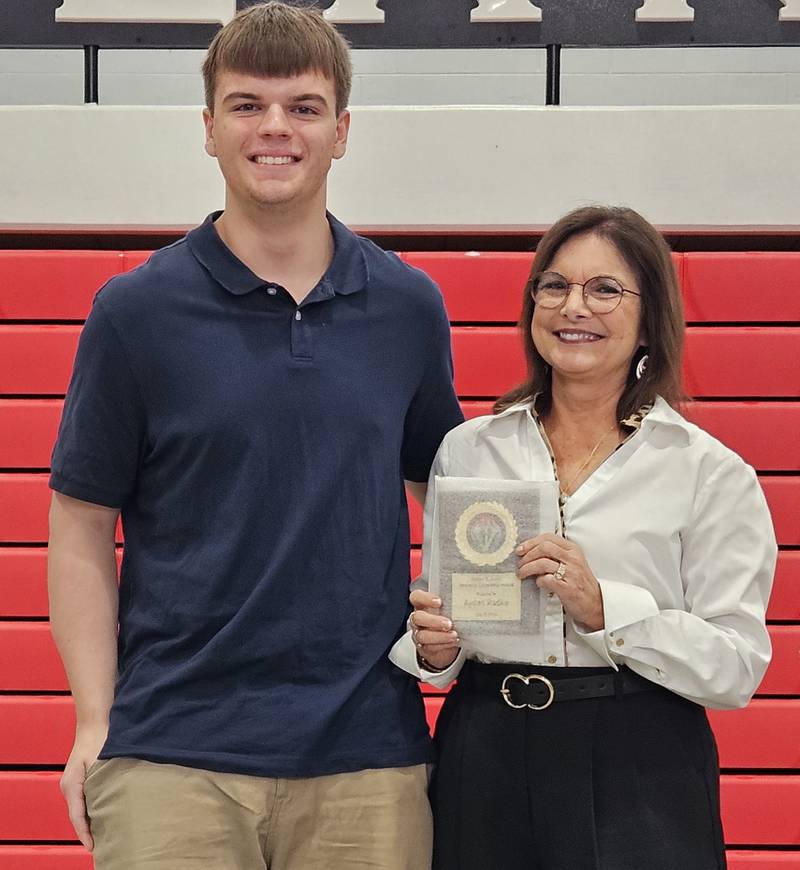 Jan Holmes presents the Robert G. Appel Citizenship Award to Aydan Radke.