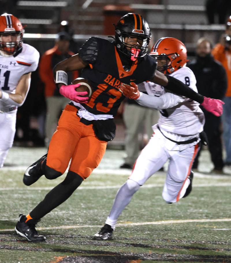 DeKalb's Davon Grant runs by a Stagg defender during their game Friday, Oct. 25, 2024, at DeKalb High School.