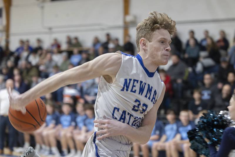 Newman’s Lucas Simpson tries to save a ball from going out of bounds against Bureau Valley Friday, Jan. 26, 2024 at Newman High School.