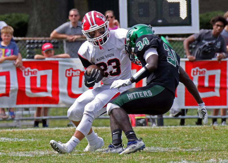 Maine South's Daniel Lazic returns a kickoff during a game at Glenbard West on Saturday, Aug. 31.