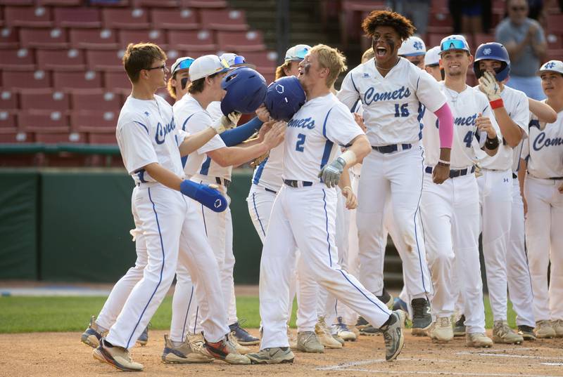 Newman Central Catholic’s Daniel Kelly (2) celebrates a home run during a game against Hope Academy at Northwestern Medicine Field in Geneva on Monday, June 2, 2025.