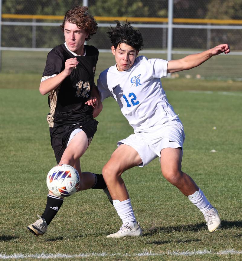 Sycamore's Maddux McLaughlin (left) and Burlington Central's David Mancera try to win possession of a loose ball Wednesday, Oct. 23, 2024, during their Class 2A Sycamore Regional semifinal.