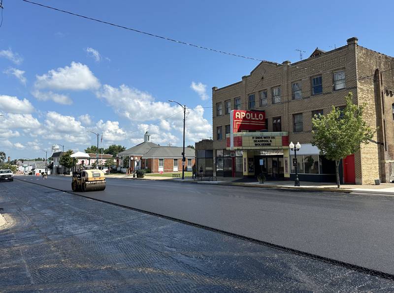 Crews pave South Main Street on Tuesday, Aug. 13, 2024 downtown Princeton. Advanced Asphalt is resurfacing the street downtown. Construction crews applied the first asphalt layer Tuesday. A  second asphalt layer will be poured Wednesday, and painting parking spots and crosswalks Thursday. The road is expected to reopen Saturday morning.
