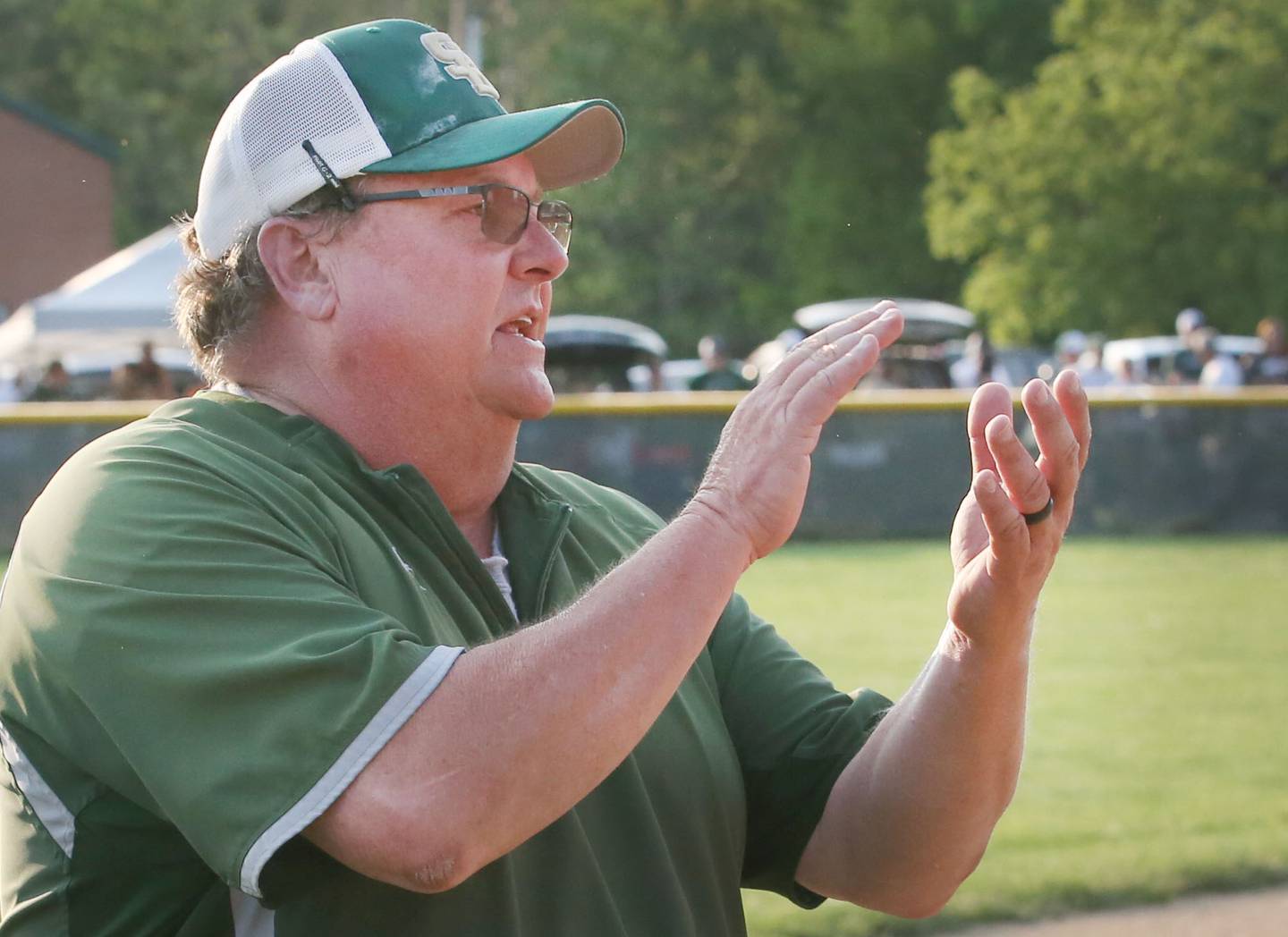 St. Bede head coach Shawn Sons cheers on his team in the Class 1A Sectional semifinal game on Tuesday, May 23, 20223 at St. Bede Academy.