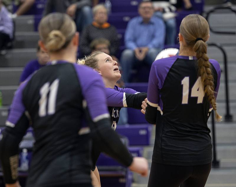 Dixon’s Emma Olson makes a pass against Rochelle Monday, Oct. 28, 2024, during regional play in Dixon.