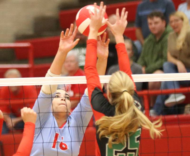 L-P's Addison Urbanski blocks a spike from Ottawa's Chey Joachim on Thursday, Sept. 21, 2023 at Kingman Gym.