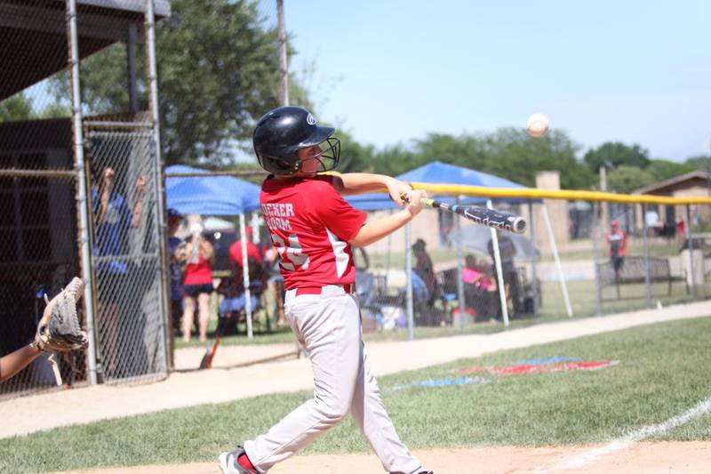 Jason Macklin connects for the Bi-County Minor League All-Stars in District 20 Tournament play.