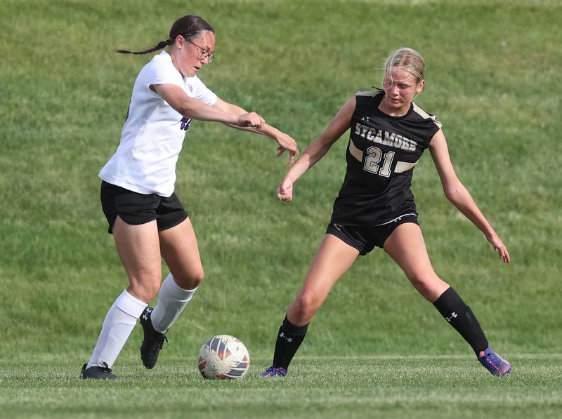 Dixon’s Rachel Lance tries to get the ball by Sycamore's Kelsie Ryder during their game Thursday May 15, 2025, at Sycamore High School.