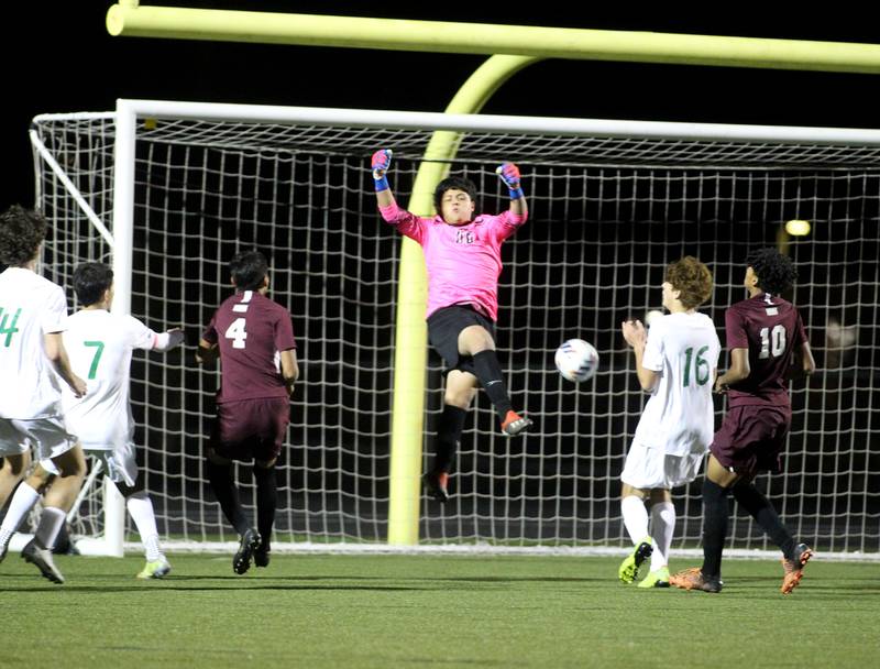 Elgin goalkeeper Kleber Rodriguez makes a save in the second half of the 3A Boys Soccer Supersectional against York at Streamwood High School on Tuesday, Nov. 1, 2022.