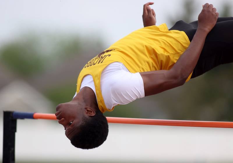 Jacobs’ Khristos Oludimu competes in the high jump in Fox Valley Conference boys track and field meet action at Huntley High School in Huntley on Thursday, May 15, 2025.